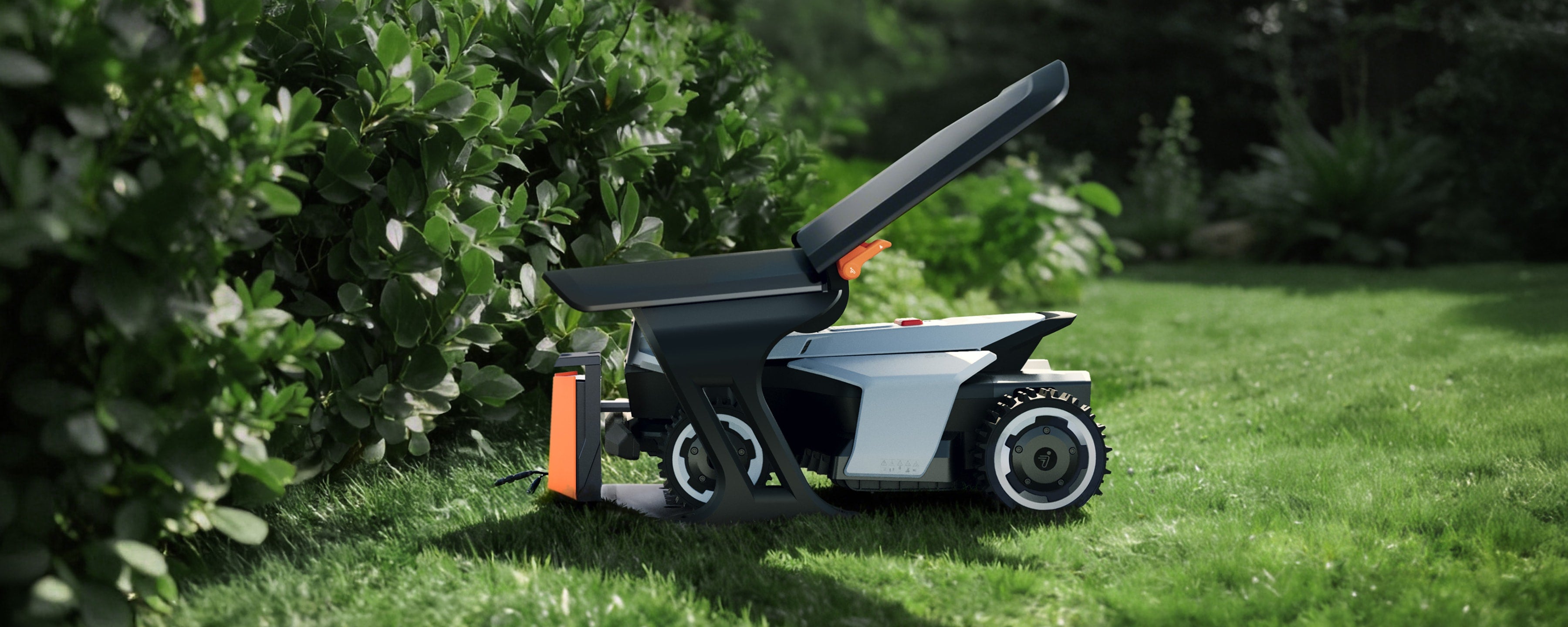 Navimow i110E robot lawn mower on a lush green lawn.