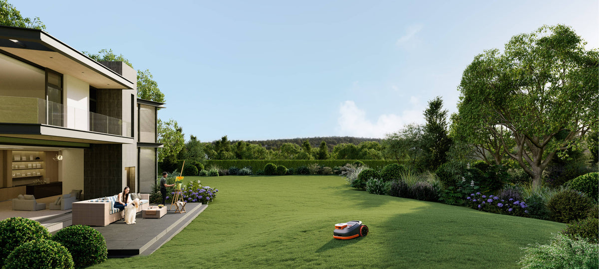 Navimow i110E robot lawn mower is mowing the large backyard.