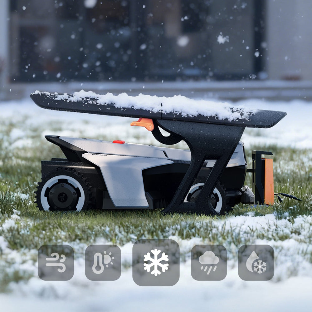 The Navimow i110E robot lawn mower sits in the snow.
