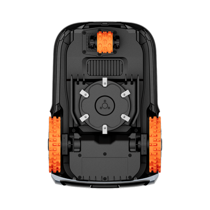 The Navimow i110E robot lawn mower is seen from below.