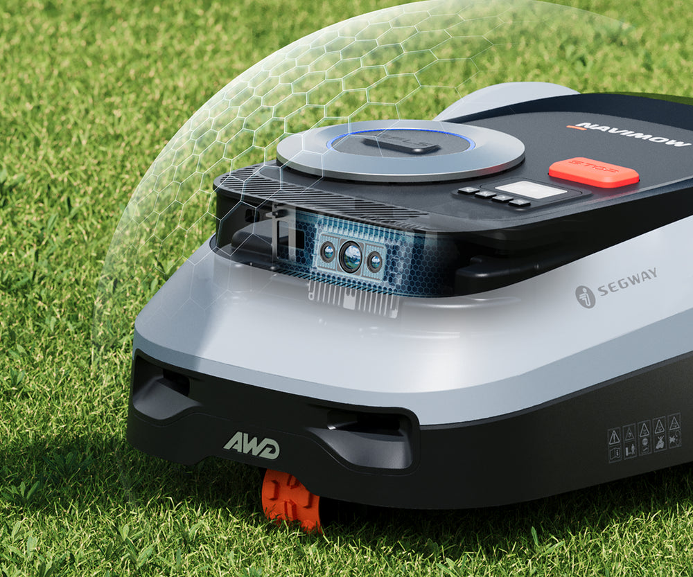 Segway Navimow i Series robot lawn mower on green grass.