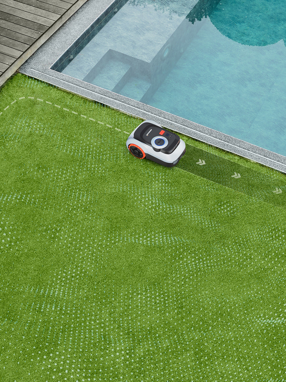Navimow i110N robot lawn mower mows grass next to pool.