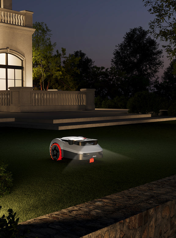 Mammotion LUBA 2 AWD robot lawn mower on the lawn.